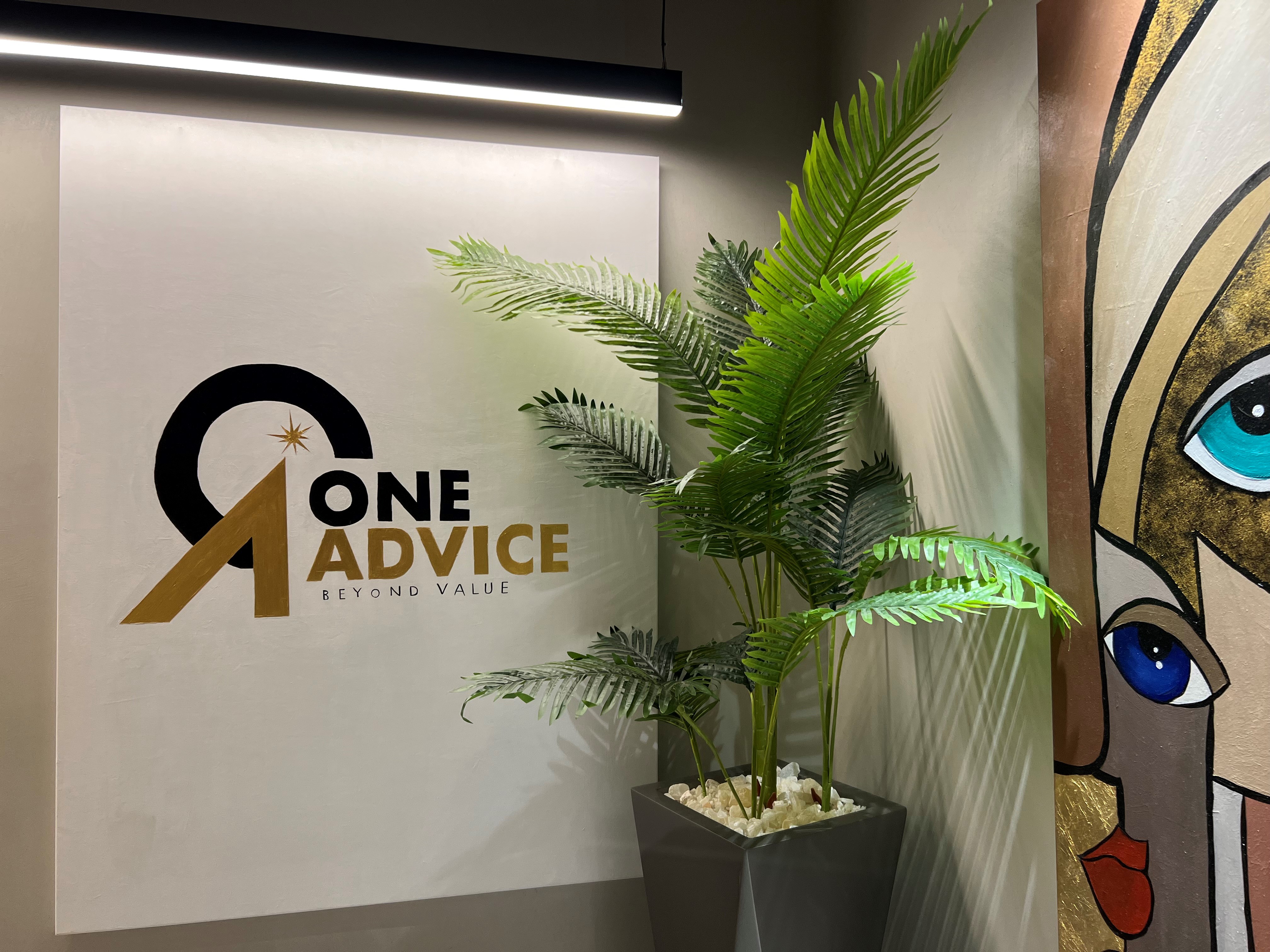 One Advice reception logo wall